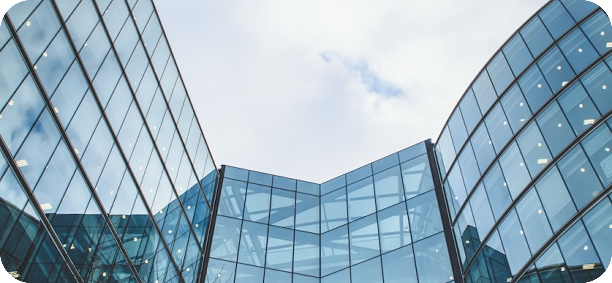 Illustration showing a person working on a laptop with various telecom icons around them